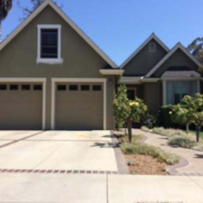 Custom craftsman home exterior with two-car garage