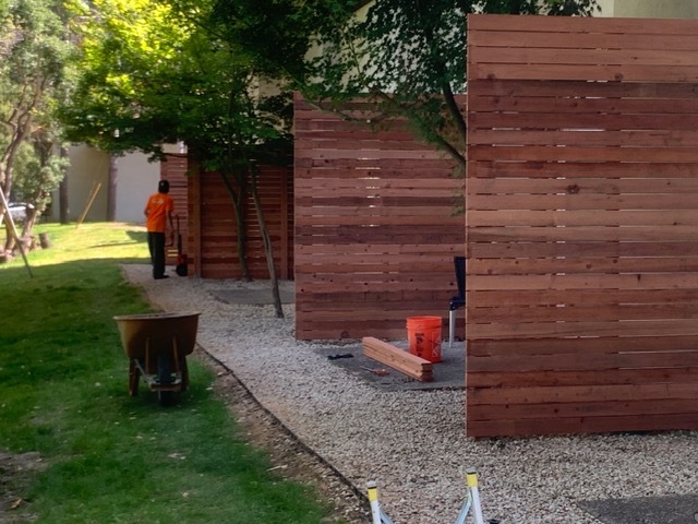 Custom redwood slat enclosures